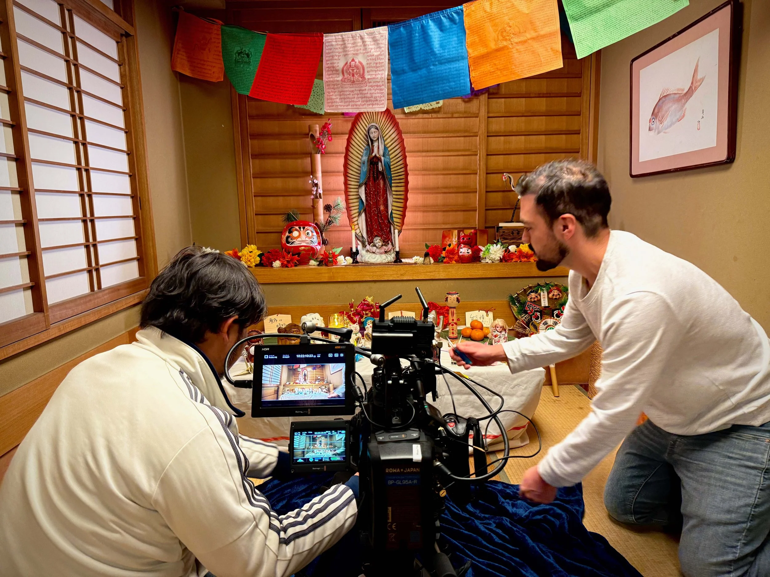 The director and crew filming the altar scene in a traditional Japanese room